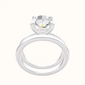 Solitaire Engagement Ring With Low Set Four Prong Head and Matching Band